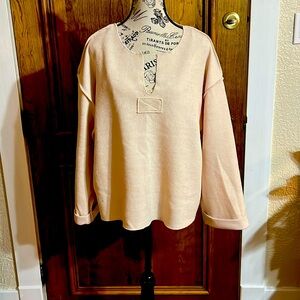 Chic Light Tan Sweater with V-Neck and Cutout Detail